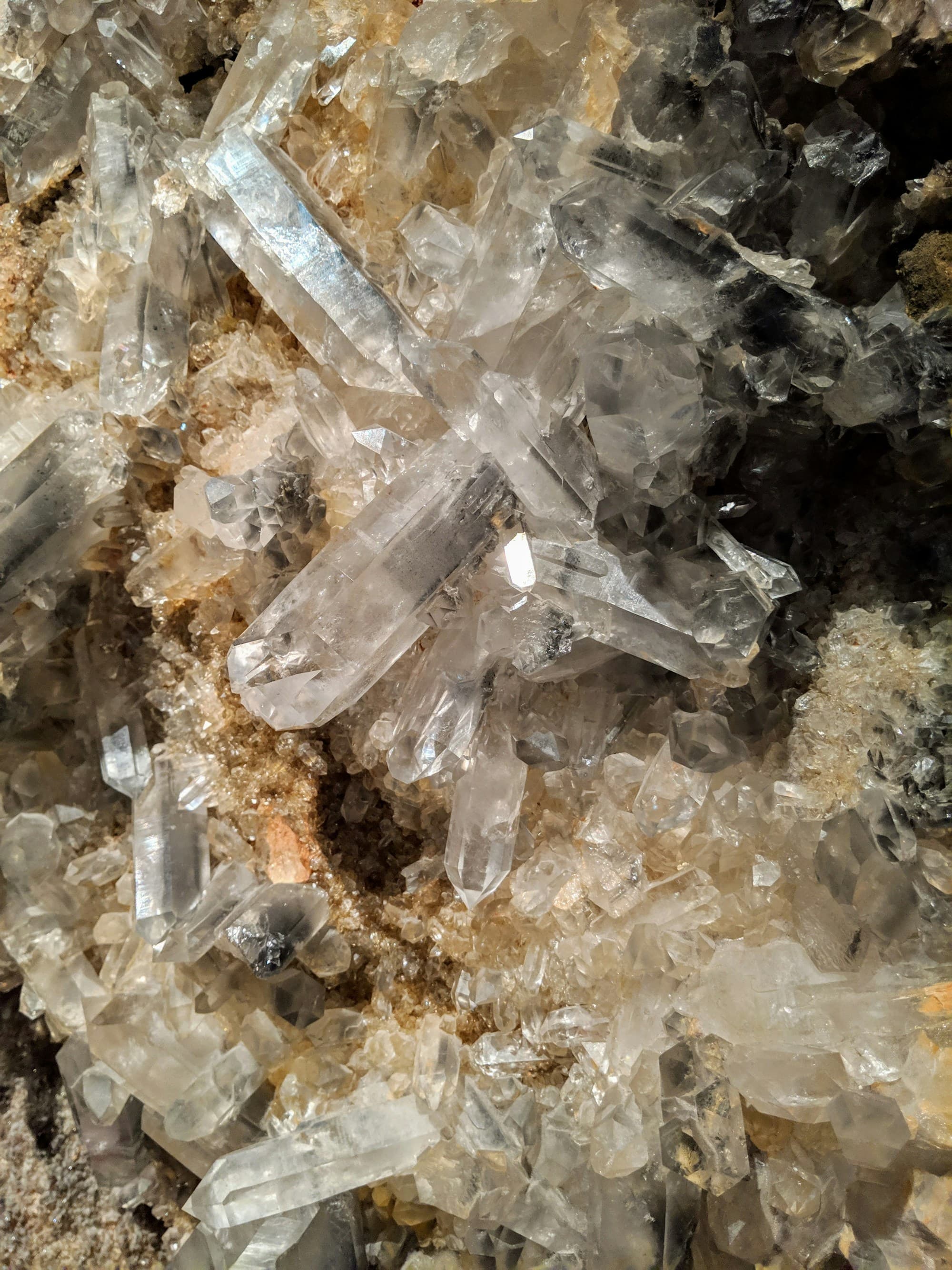 Close detail of quartz in host rock, translucent white crystals packed across a broken face
