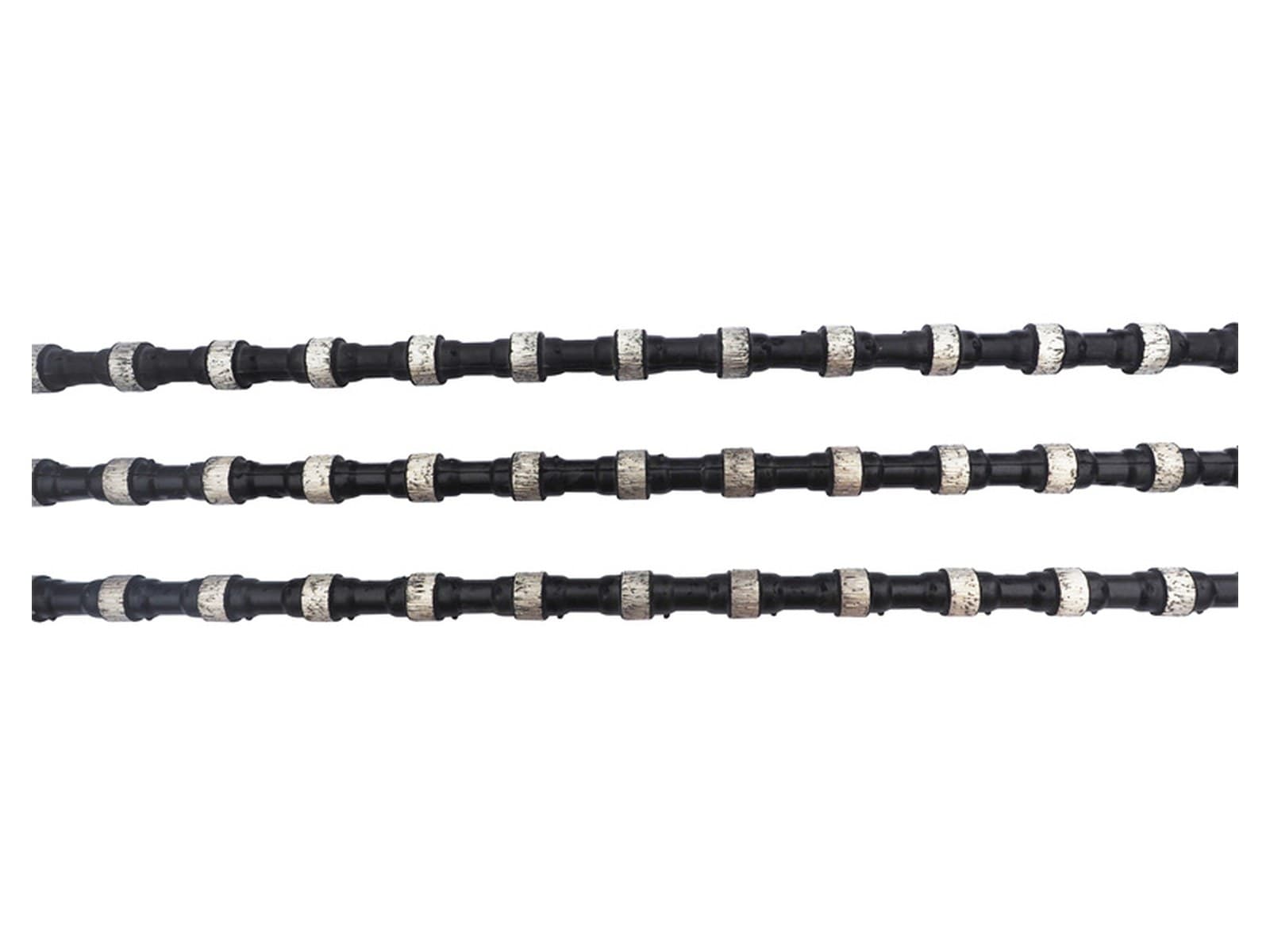 Three lengths of rubber moulded diamond wire, the sintered beads spaced along the steel cable