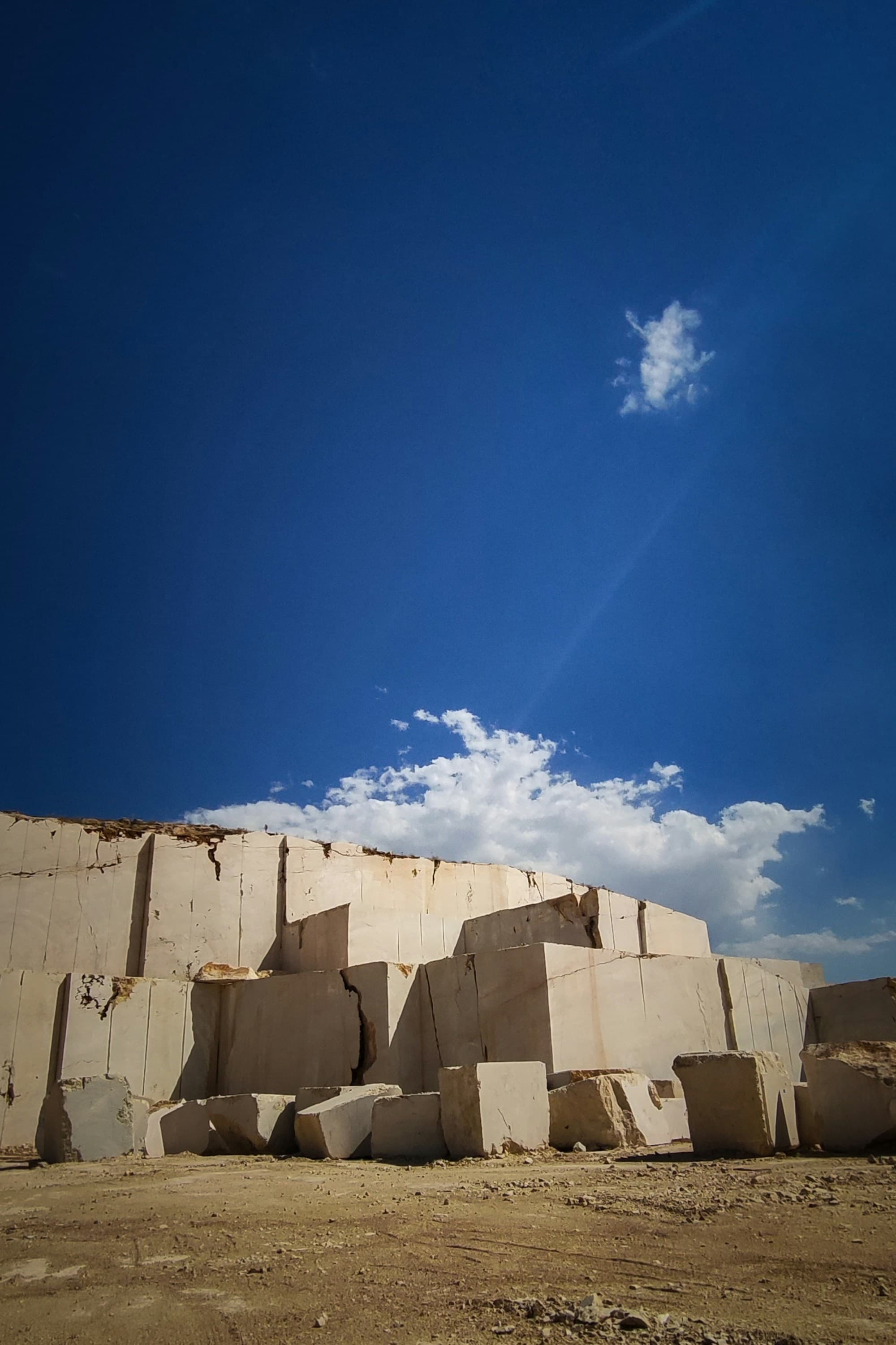 White marble quarry worked into dry pale hills in Bajaur